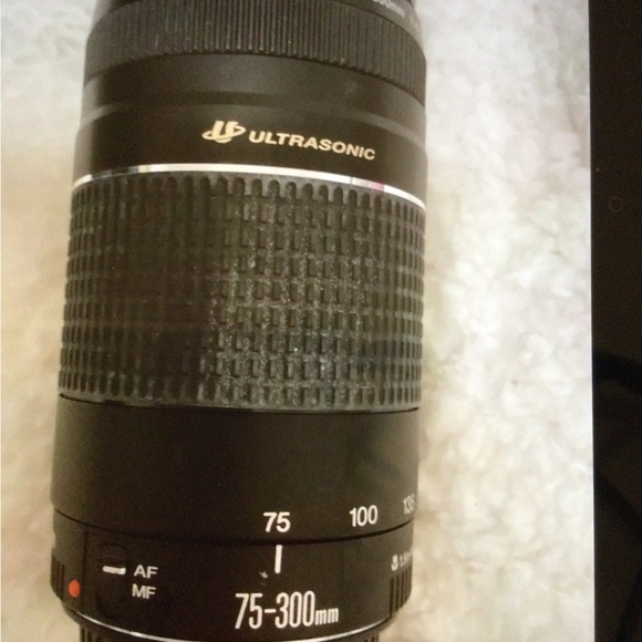 Canon Rebel with two zoom lenses and a wide-angle lens. - Picture 5 of 12